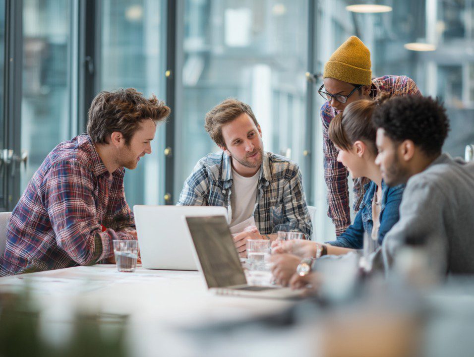 Professional team collaborating on goals